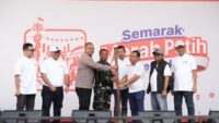 BRI Region 6 Meriahkan Pasar Malaka Rorotan, Dibuka dengan Simbolis Penumbukan Padi