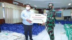 Pertamina Distributes Hundreds of Basic Food Packages through Lanal Cilacap