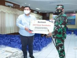 Pertamina Distributes Hundreds of Basic Food Packages through Lanal Cilacap