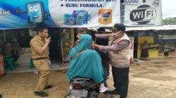 Polsek Dayeuhluhur Cilacap Bagikan Masker Kepada Masyarakat
