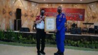 Yasonna Serahkan Sembilan Kekayaan Intelektual ke Korpolairud Polri